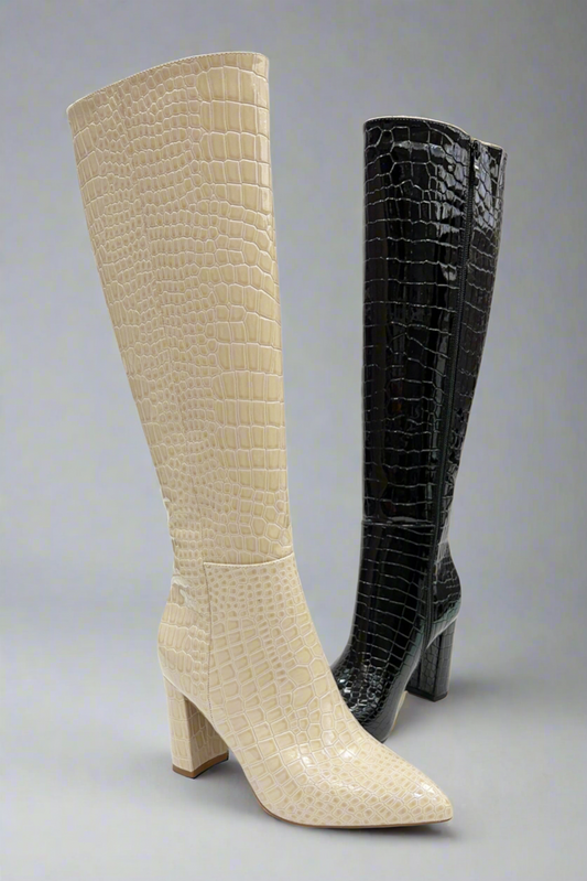 Martha croc patent pointed-toe tall boots with black boot in the background
