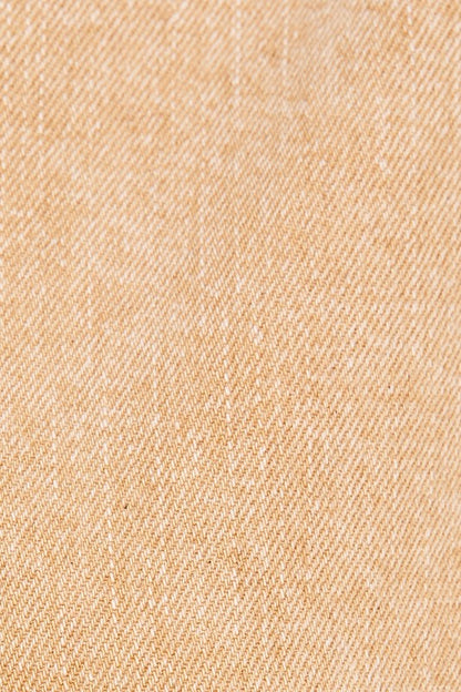 Close-up of beige fabric texture